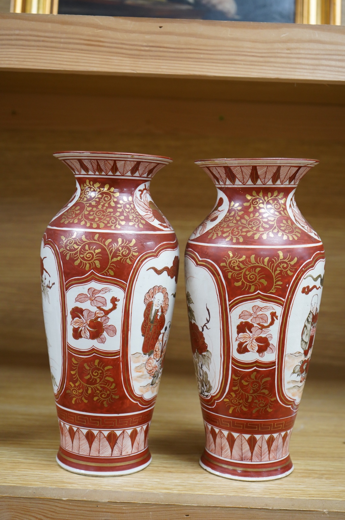 A pair of Japanese Kutani vases, signed, Meiji period (1868-1912), 25cm